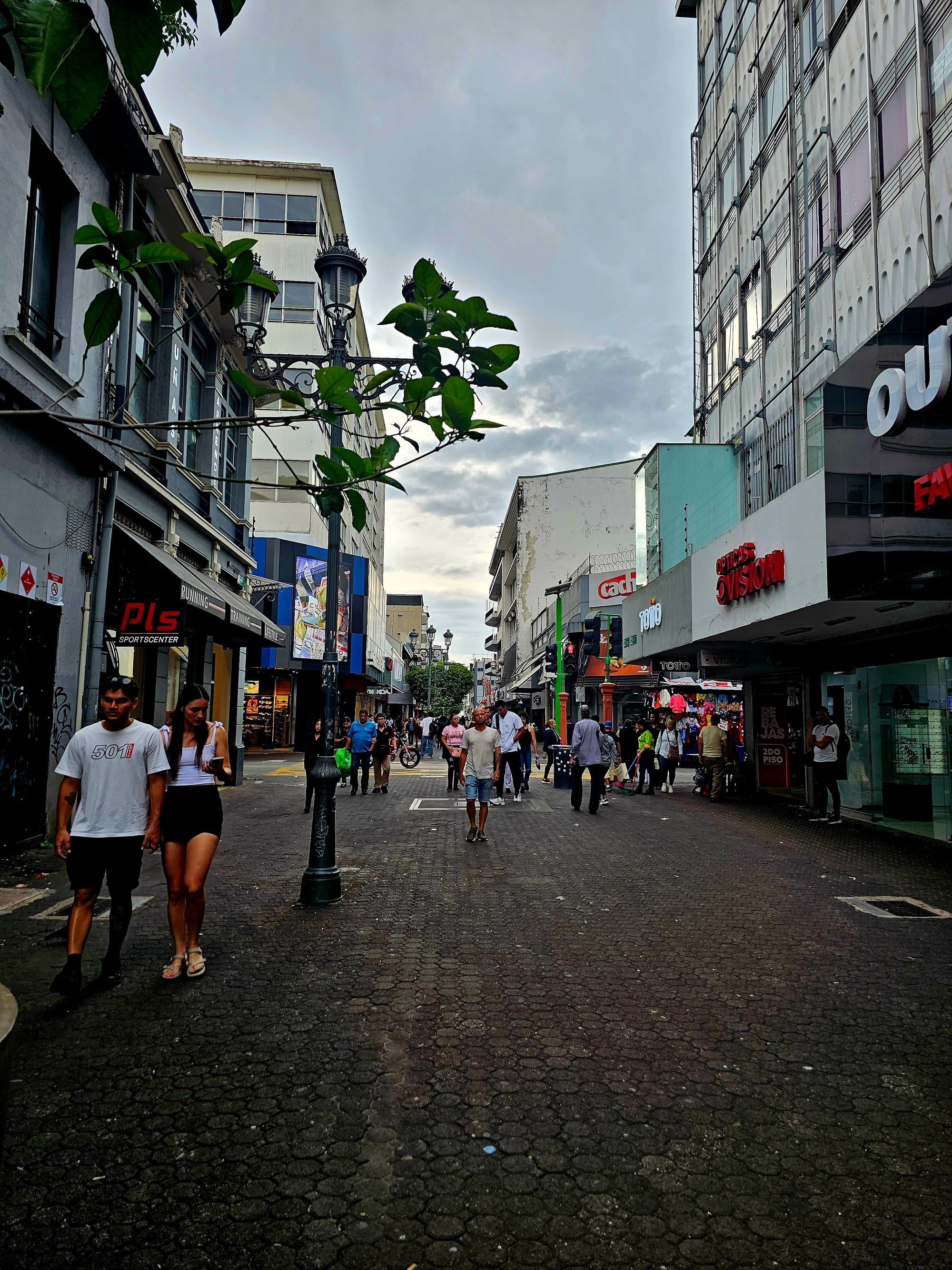 Pedestrian streets in San José — busy, a little gritty, and full of everyday city life unfolding at street level.