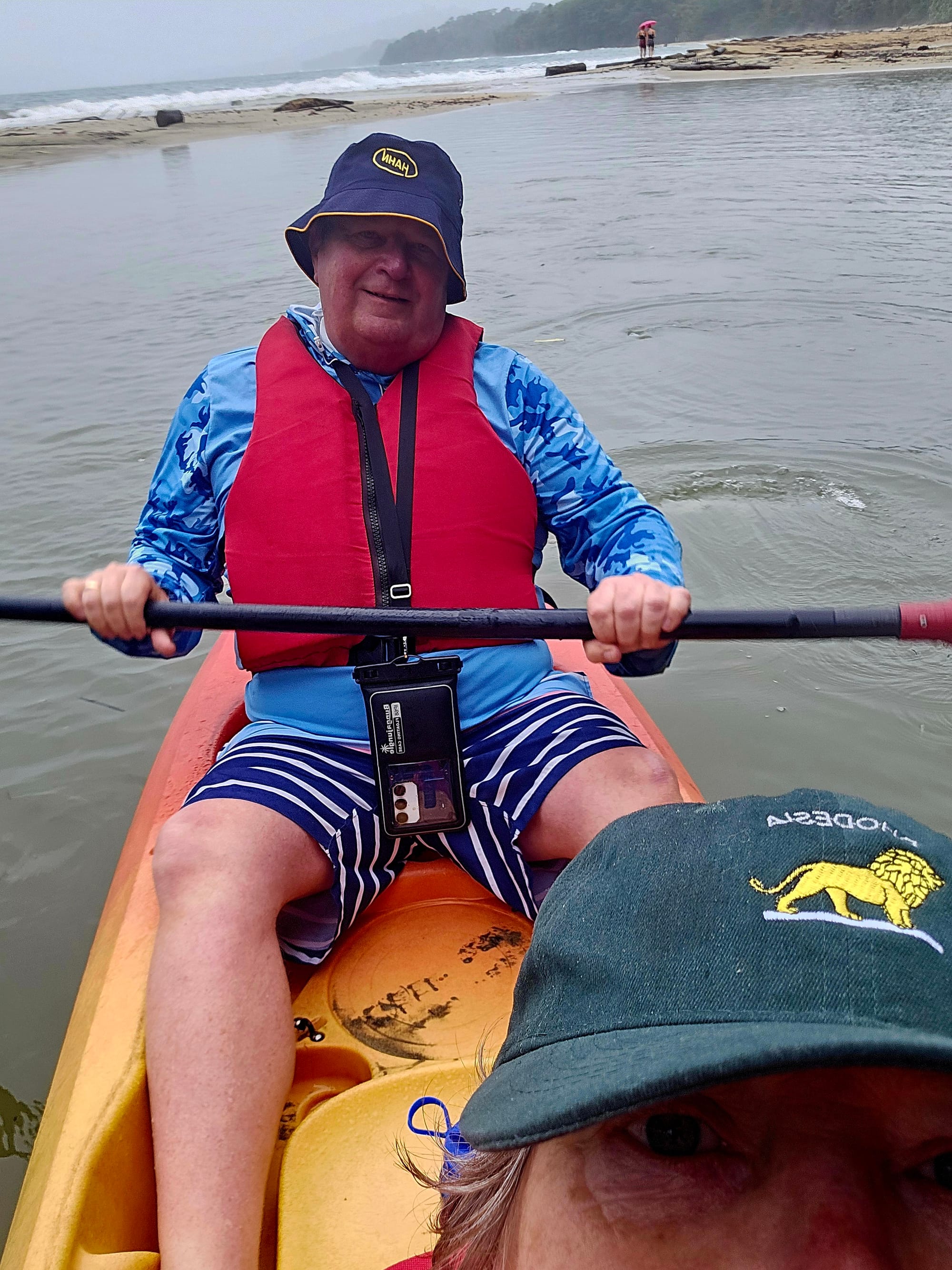 Paddling the Uva River — calm water, heavy rain, and jungle closing in around us.