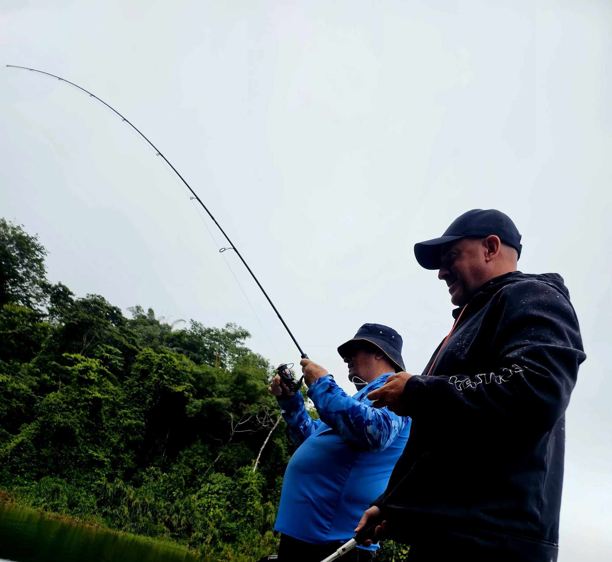 Fish on at Lake Arenal, the rod loading up as the fish made its first run.