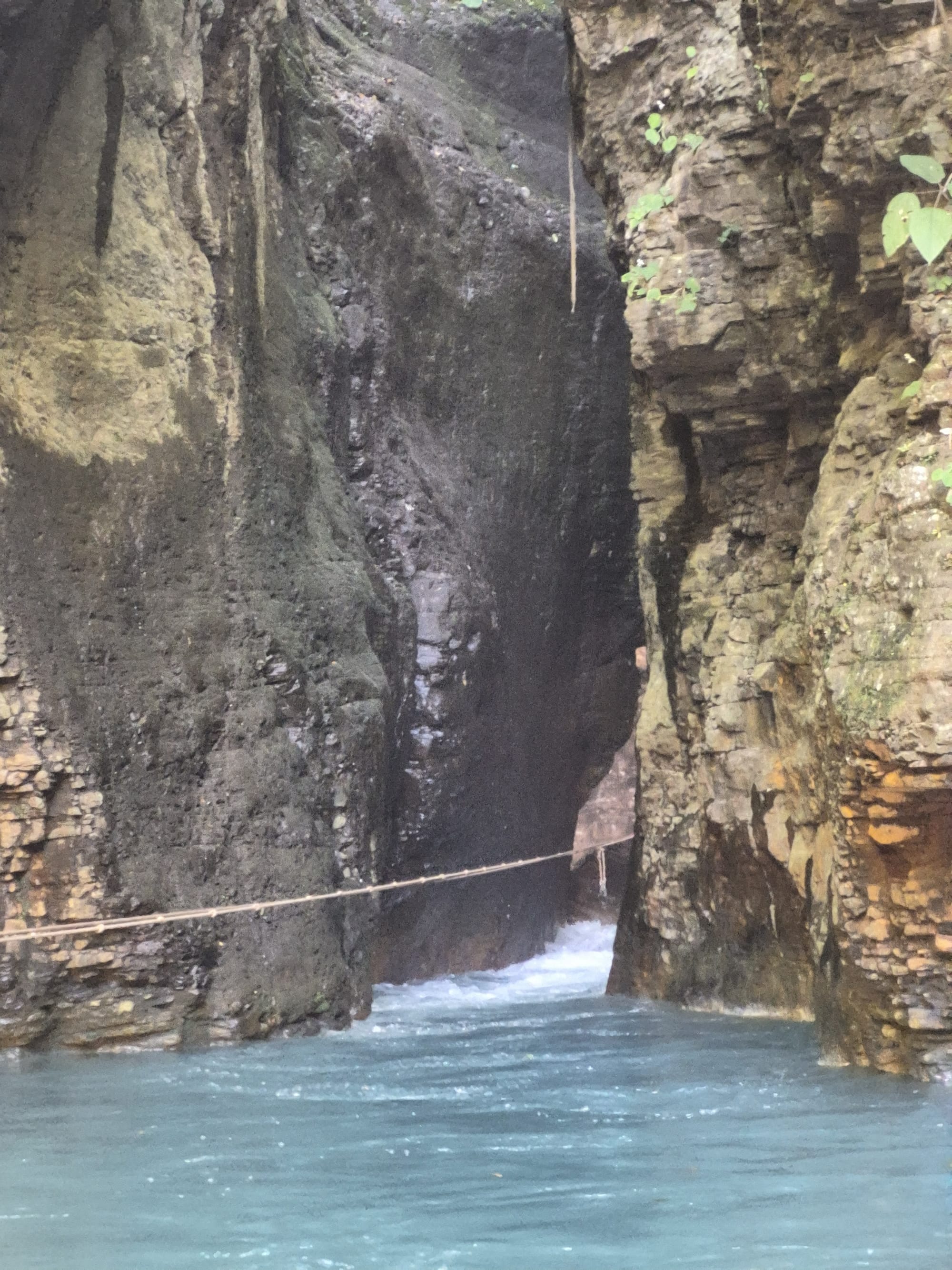 The rope crossing to reach the waterfall