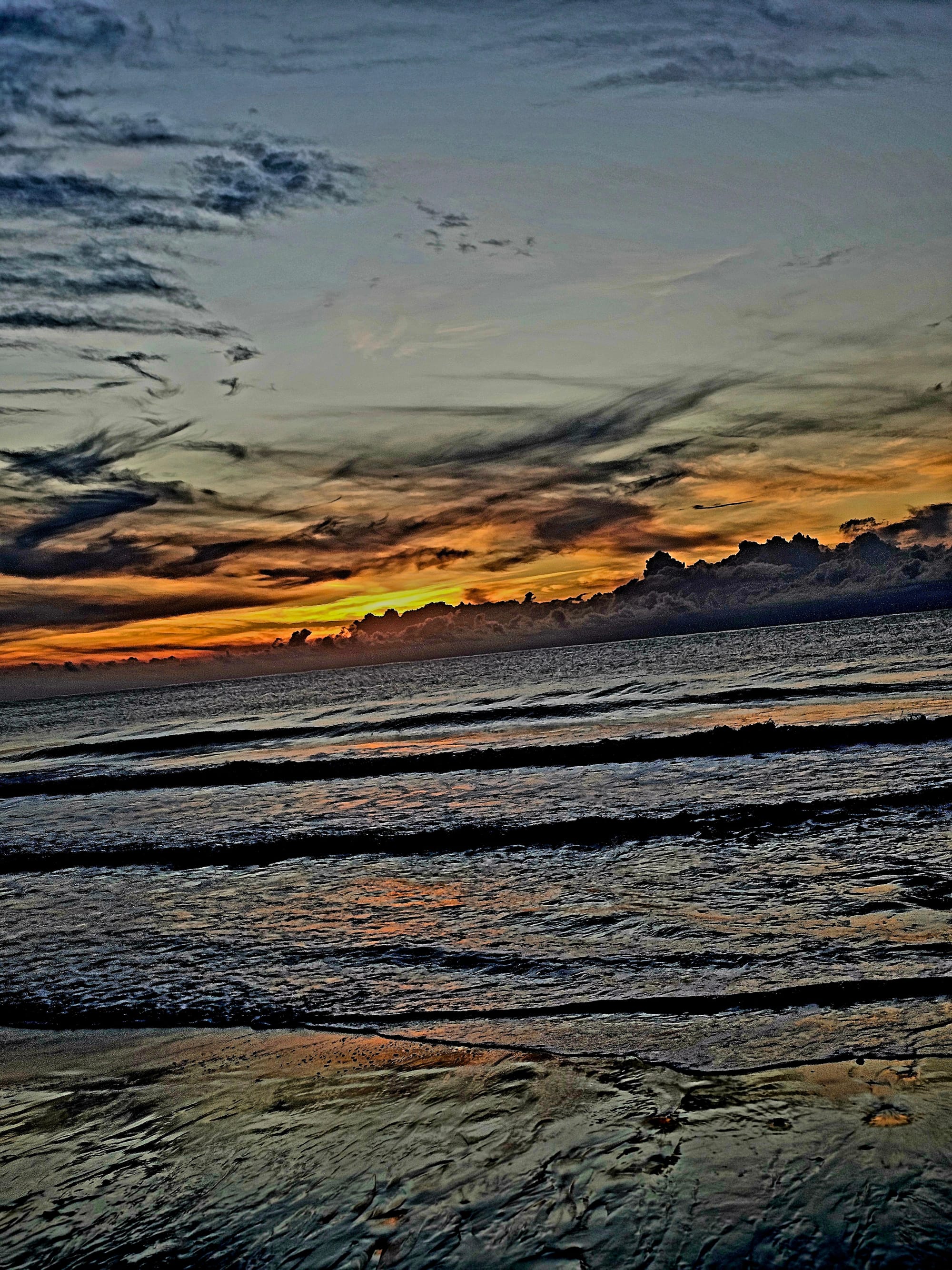 Montezuma — Sunrise on the final morning, the Pacific calm and glassy, light breaking over the horizon as Montezuma eased into the day and the trip quietly came to a close.D